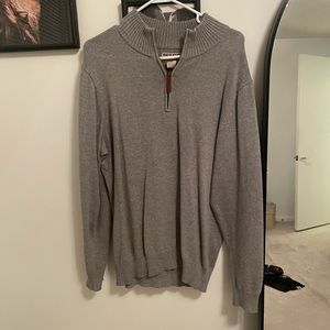 Grey zip-up Duluth sweater